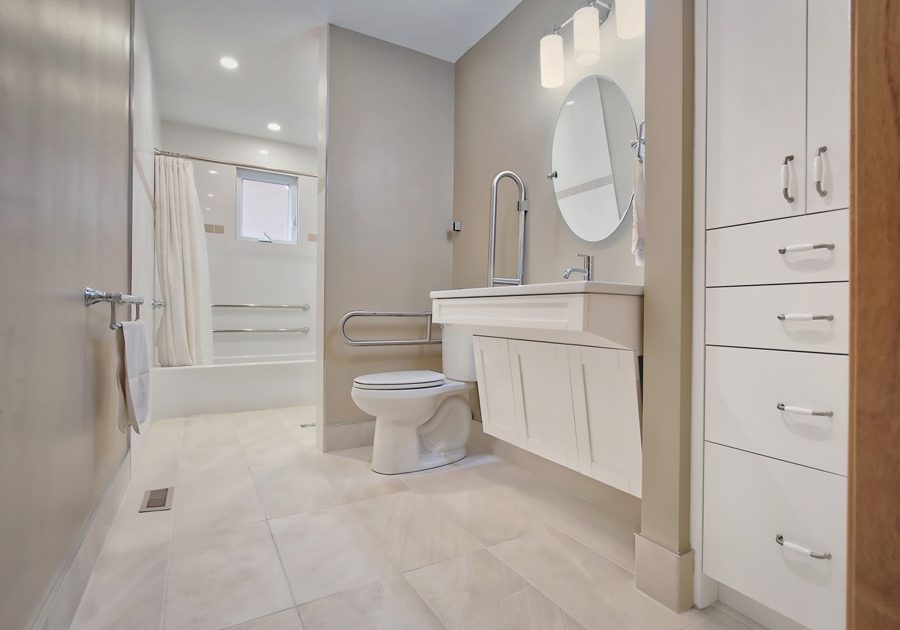 Accessible vanity, fold-down toilet grab bars, tilt-mirror; Accessible bathroom Renovation Mississauga